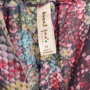 Sleeveless multicolored top. Size medium.  Really pretty colors